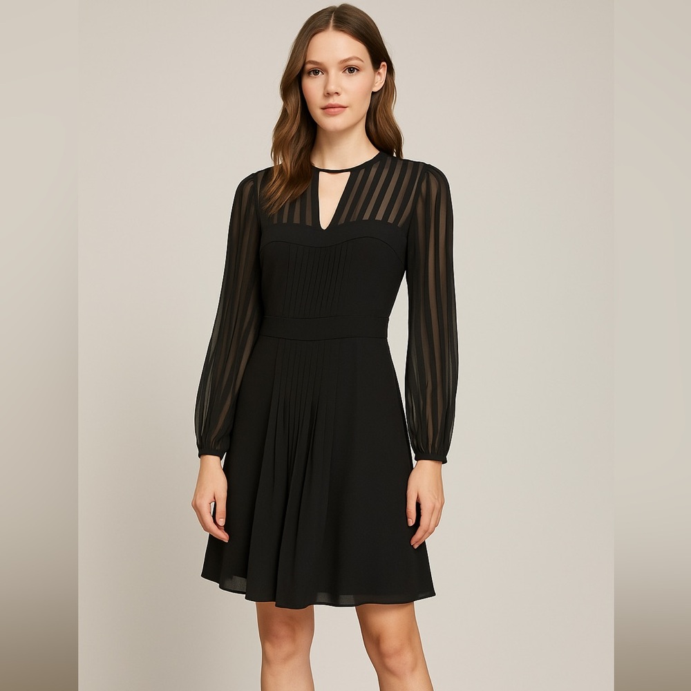 BCBG Max Azria. Black dress with silk top and sleeves. Size 0.